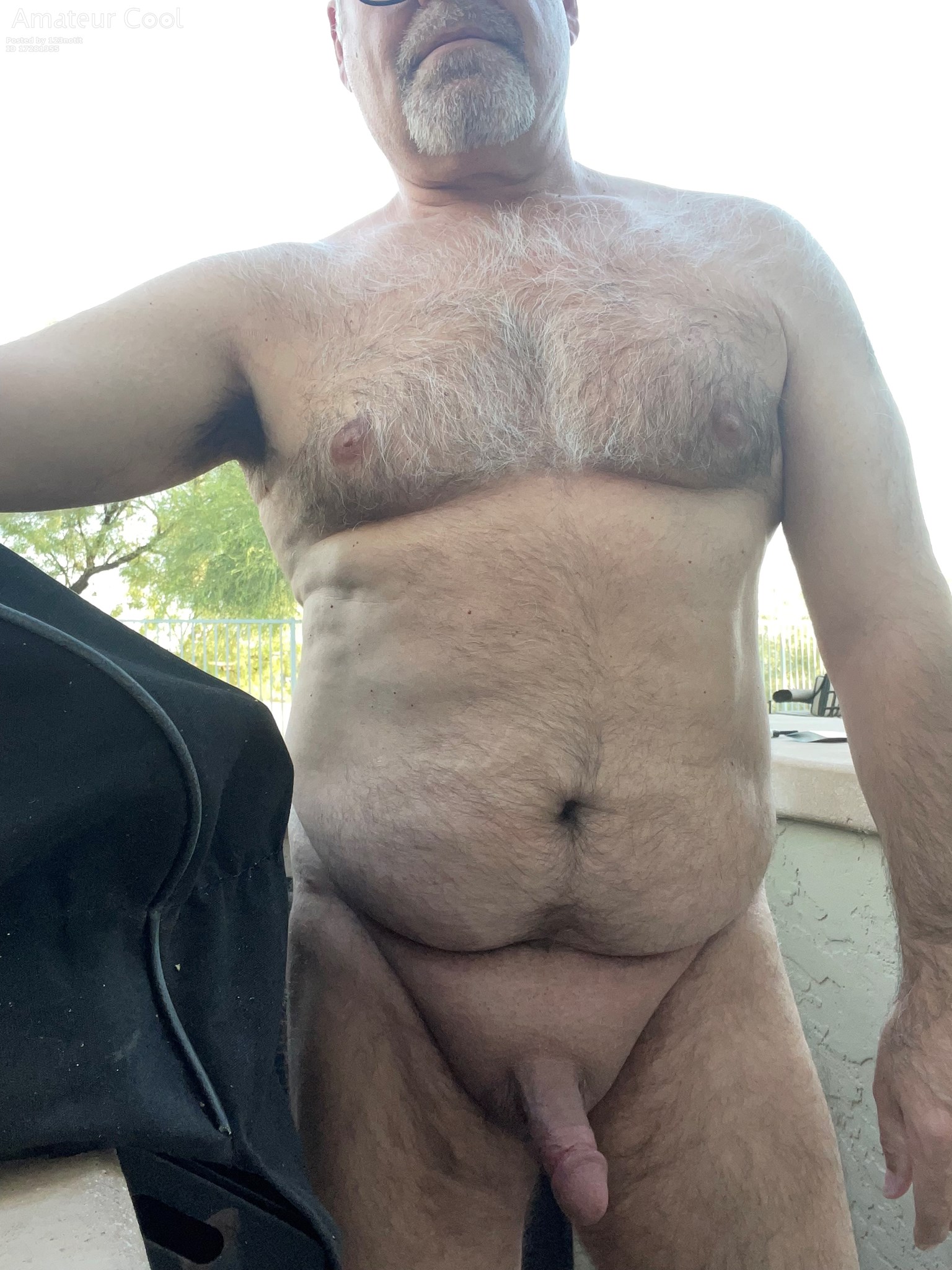 Messing around in the backyard while the neighbors are outside. 